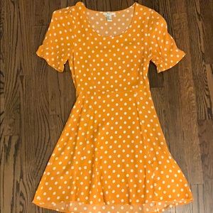 orange and white polka dot dress